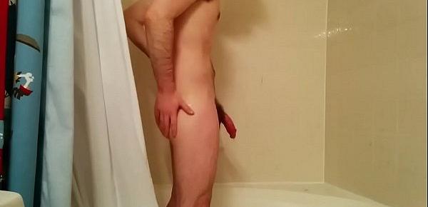  hung guy taking a shower